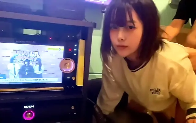 Karaoke night turns steamy as she gives in to a forbidden craving