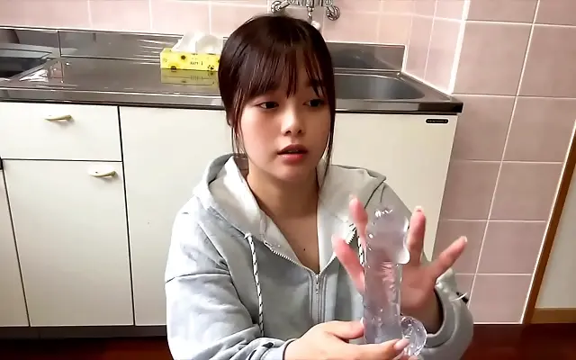 Japanese college girl explores her scent with a forbidden dildo fantasy