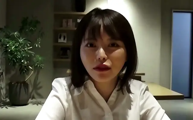 Japanese office beauty teases with a sultry blowjob in the hotel