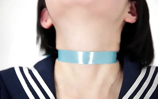 Seductive Japanese muse sips water with delicate ribbon bondage allure