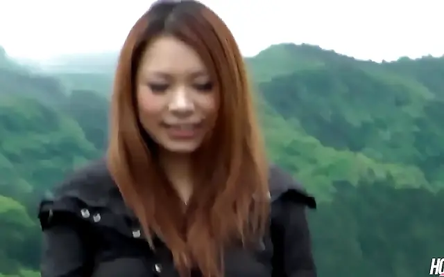 Naughty Japanese brunette Kai Miharu rides hard and swallows outdoors