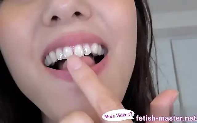 Japanese Beauty Devours Face and Tongue in Wild Kissing Handjob